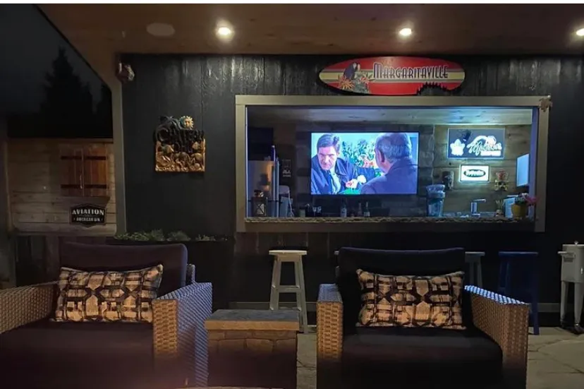 Inside the cabana: the bar, the screen and the seating