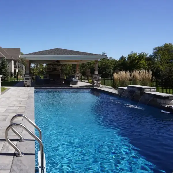 Rectangular pool with a wide paver surround