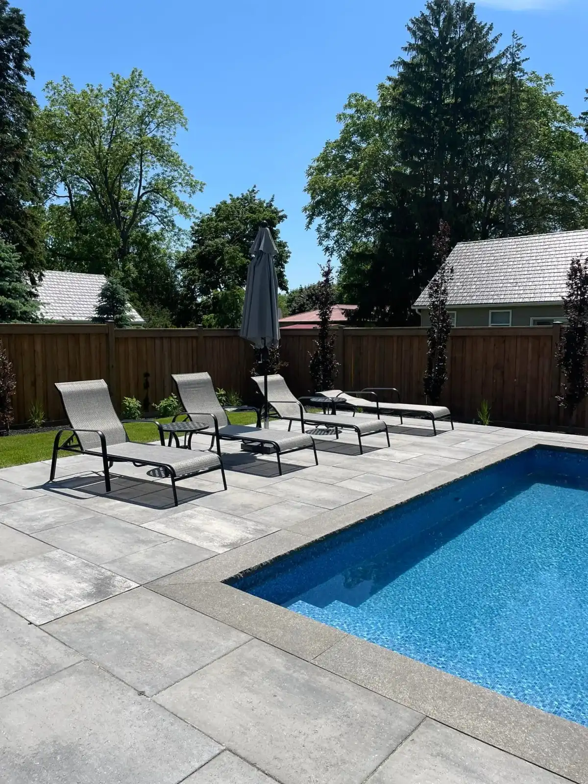 Pool with loungers and a pergola