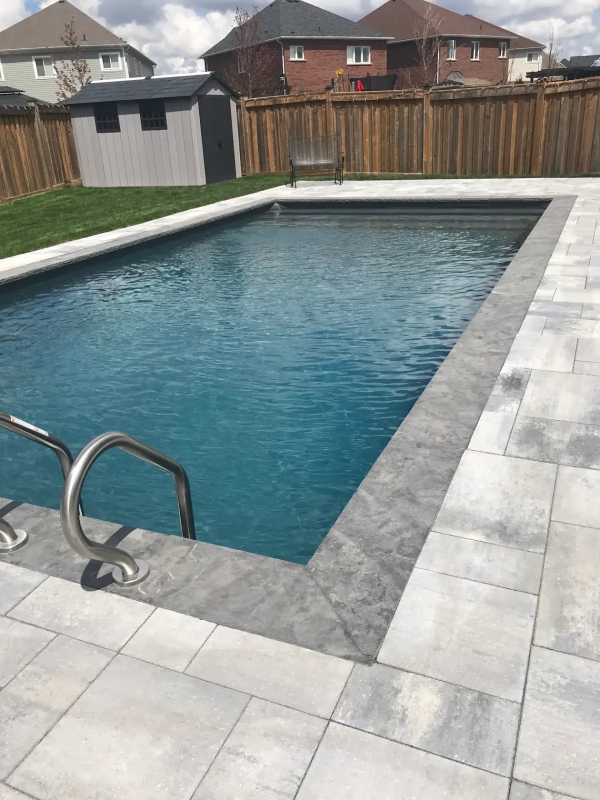 Rectangular pool with a large-format paver surround