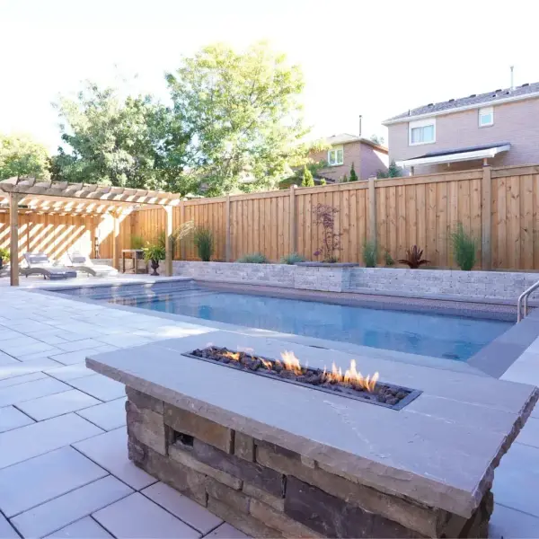 Pool and a linear fire table on the patio