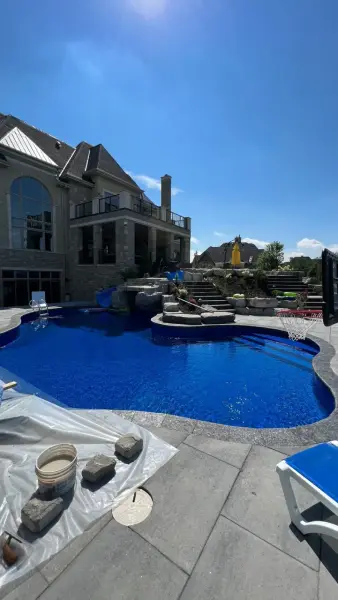Freeform pool and rock feature from the patio