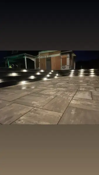 Step lighting across the patio at night