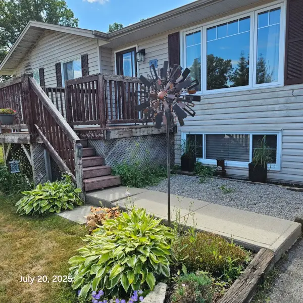 Before, the home's old rotting wood deck and stairs