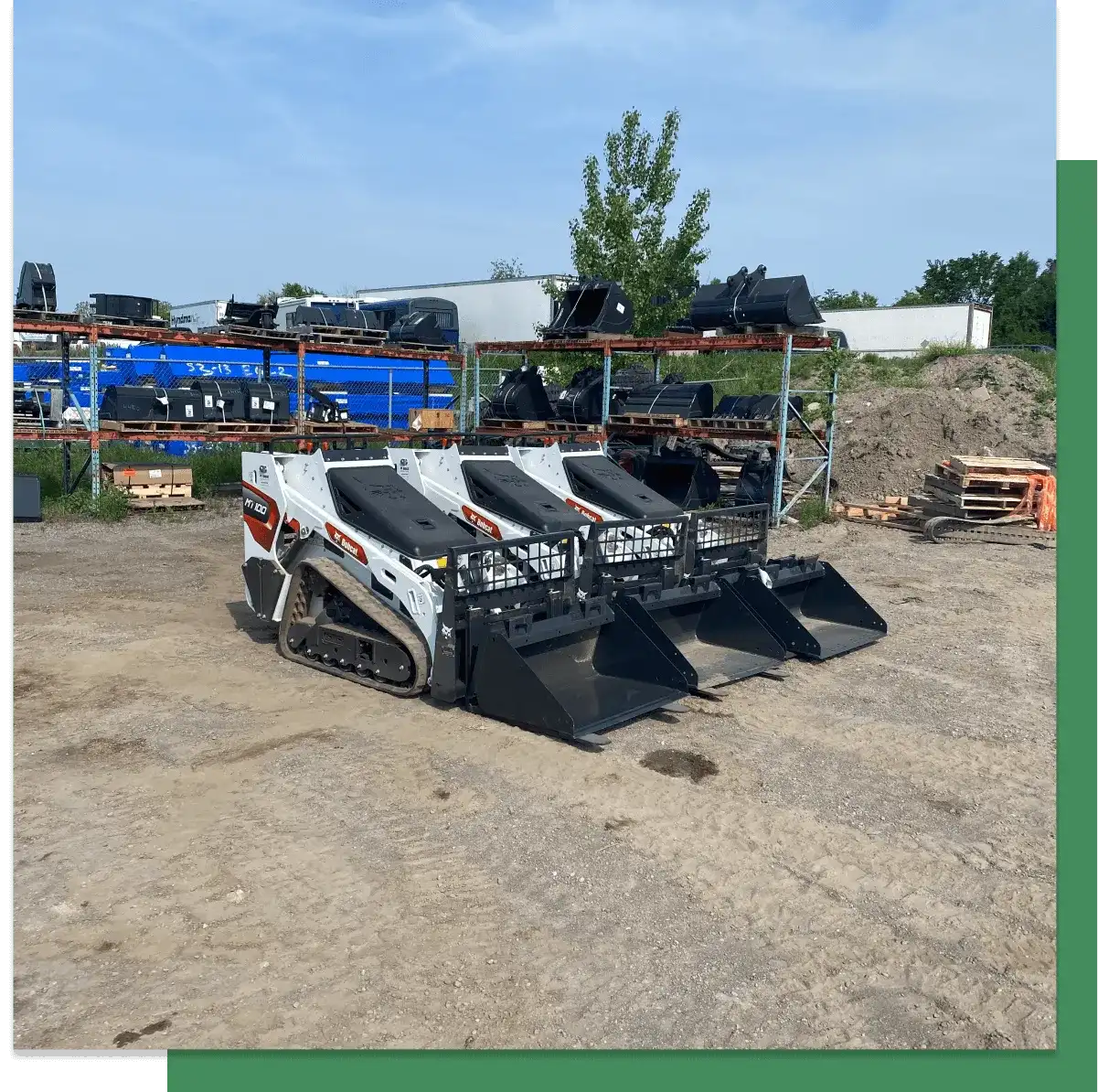 MWG rental machines and attachments lined up in the yard