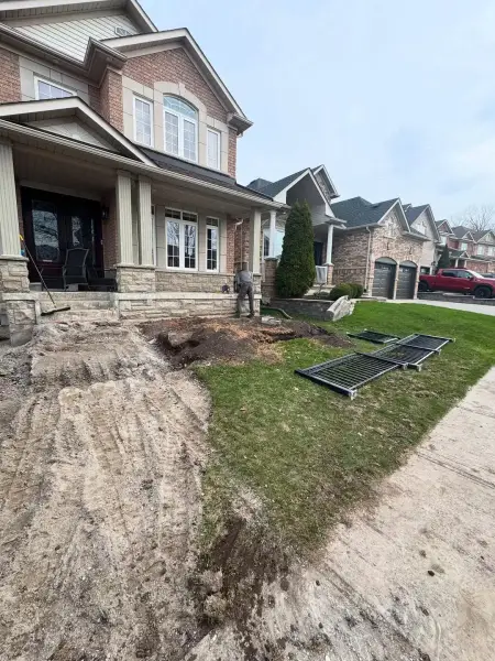 Front yard stripped to dirt before work
