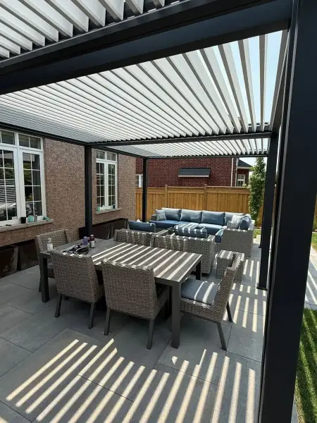 Louvered pergola over the outdoor dining set